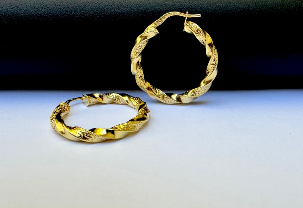 Argollas Torcidas Versace