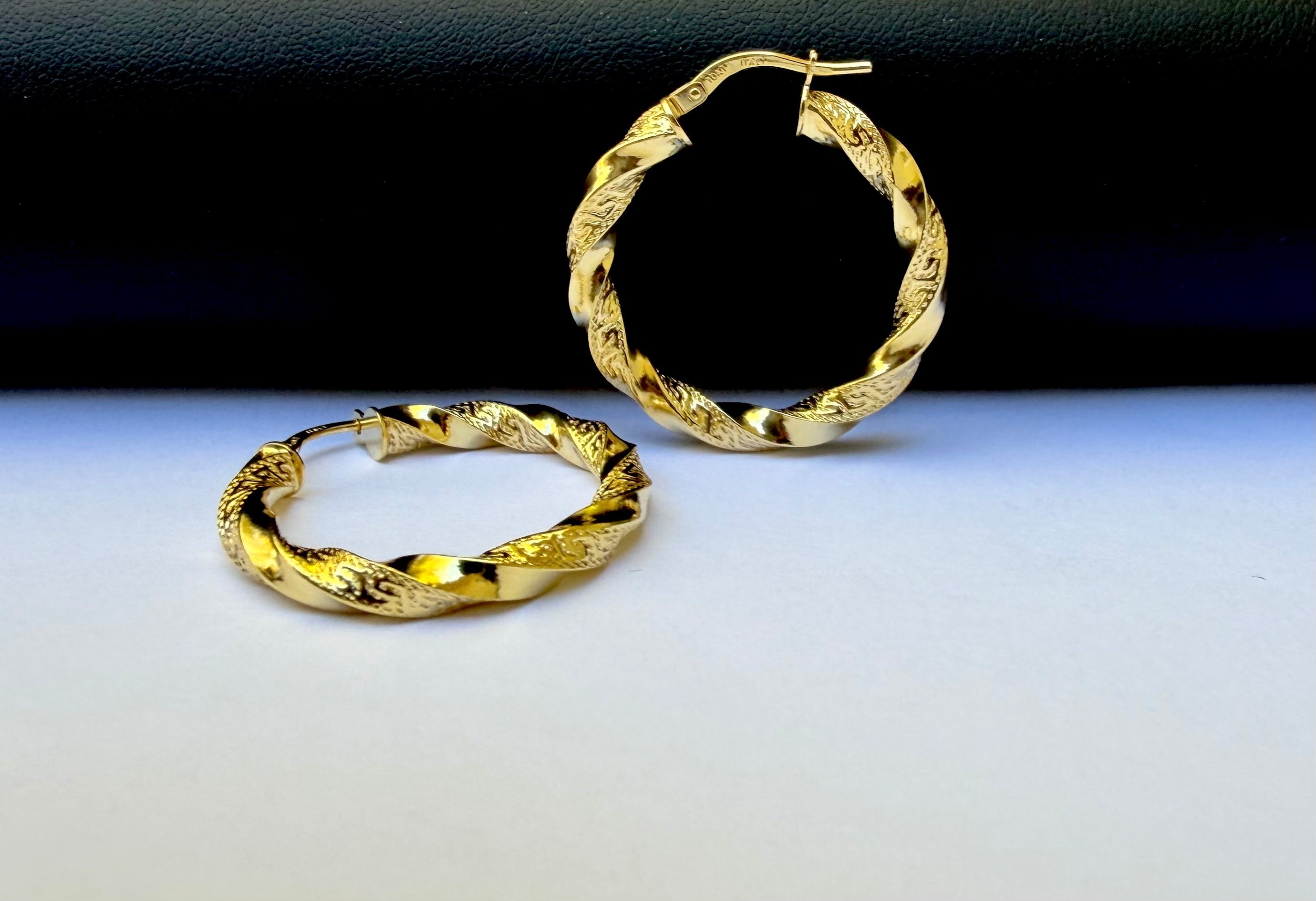 Argollas Torcidas Versace