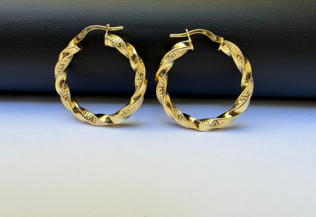 Argollas Torcidas Versace